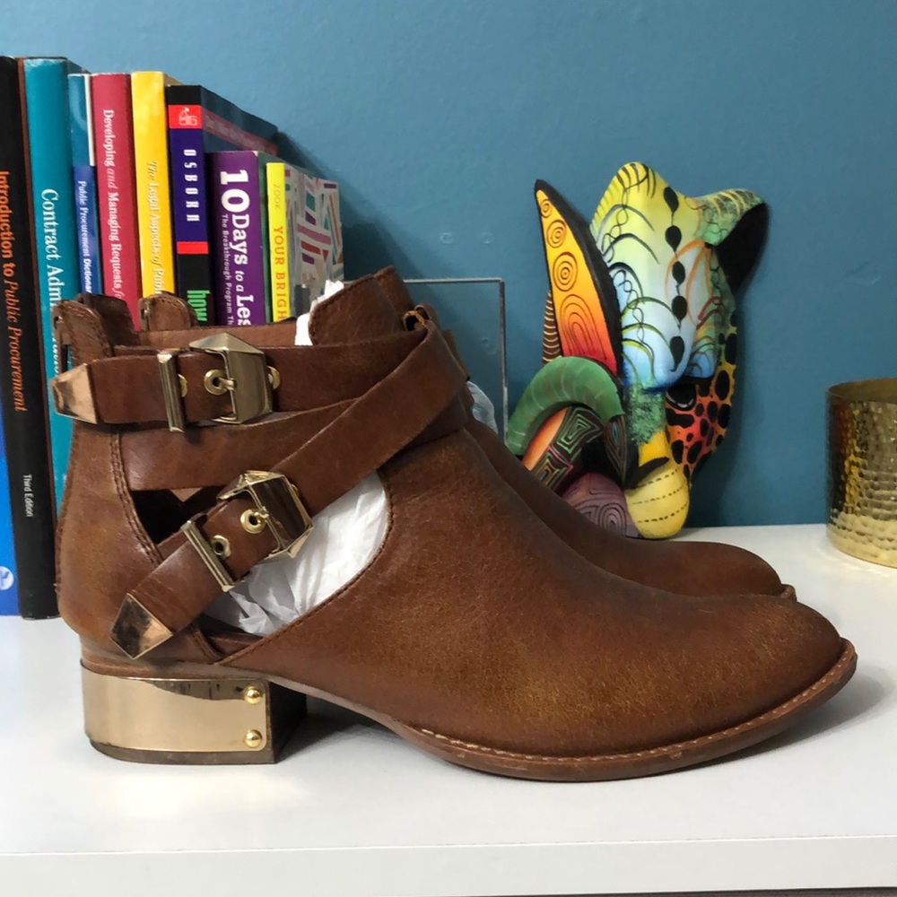 Unique boots gently worn